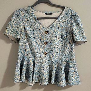 Soft floral blouse with accent buttons
